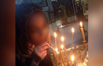 СК проверяет студентку из Кемерова, которая прикурила от свечи в храме